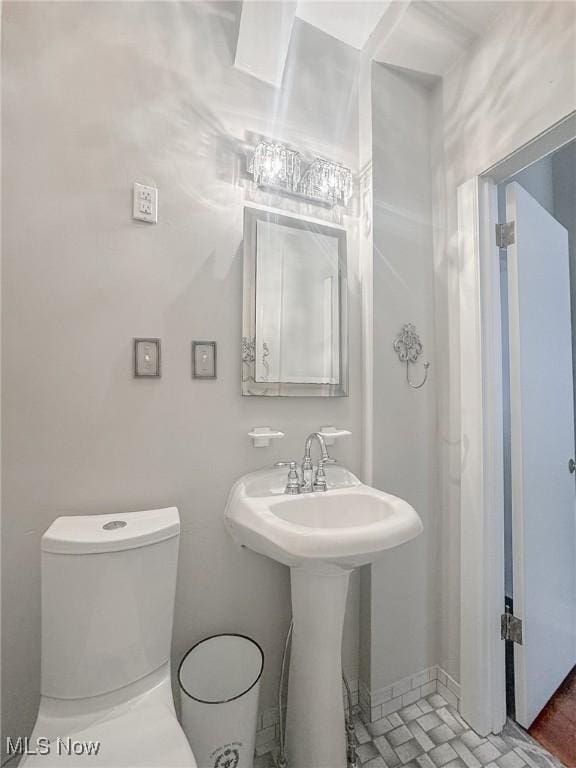 bathroom featuring toilet