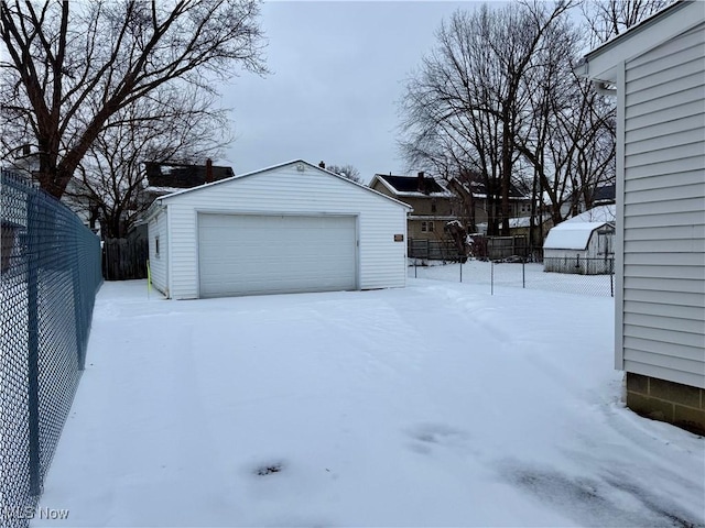 view of snow covered garage