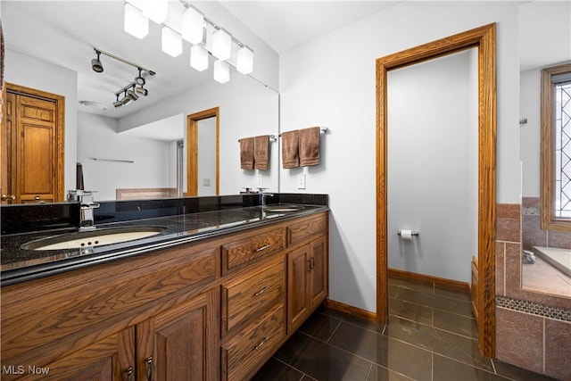 bathroom with vanity and tile patterned floors