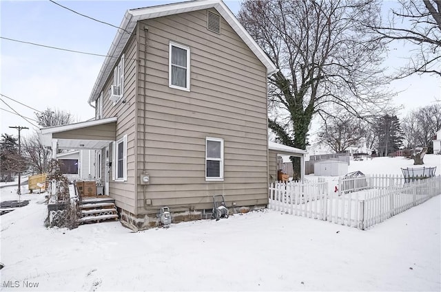 view of snow covered property