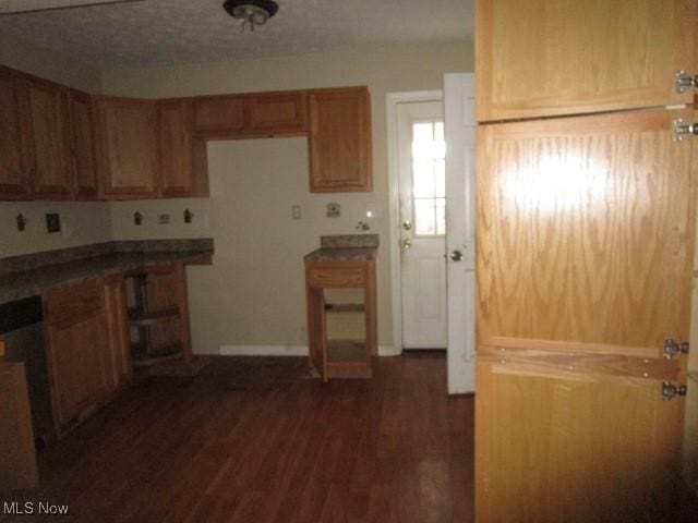 kitchen featuring dark hardwood / wood-style floors