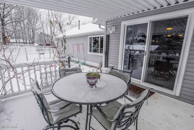 view of snow covered patio