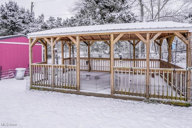 view of snow covered deck