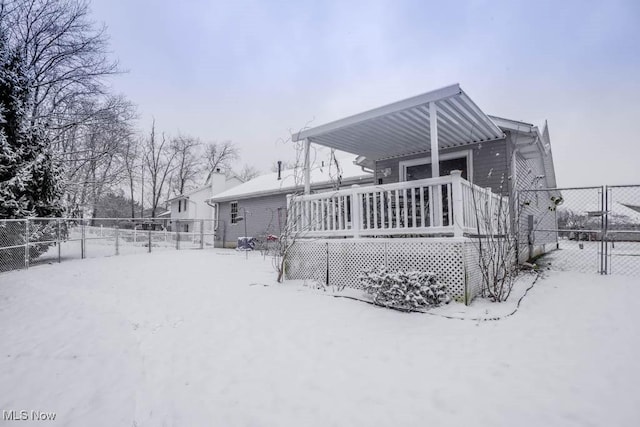 view of snow covered house