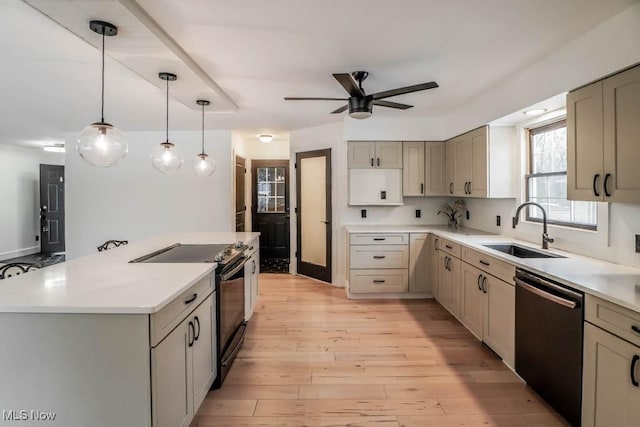 kitchen with electric stove, pendant lighting, black dishwasher, sink, and light hardwood / wood-style flooring