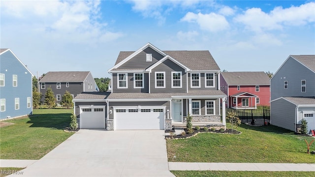 view of front facade with a front yard and a garage