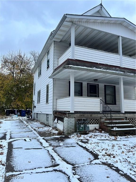 exterior space featuring covered porch