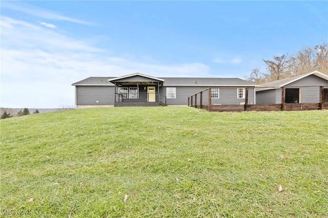 ranch-style home with a front yard