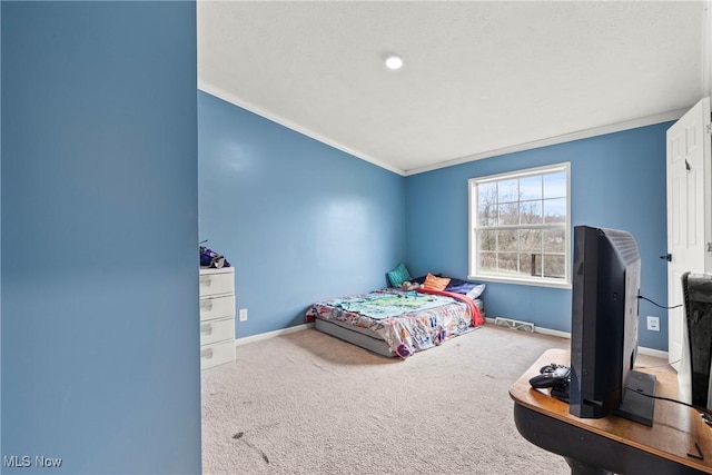 carpeted bedroom with crown molding