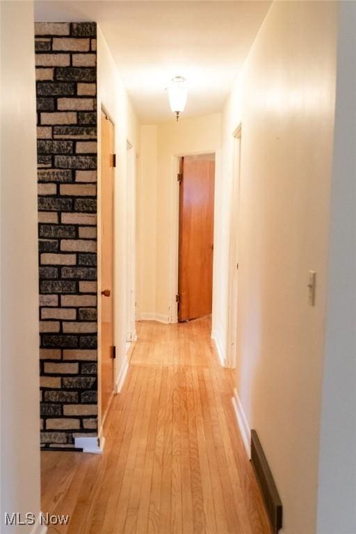 hallway featuring light hardwood / wood-style floors