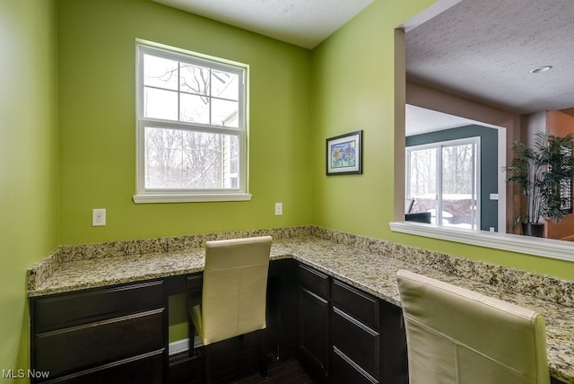 bathroom featuring a textured ceiling