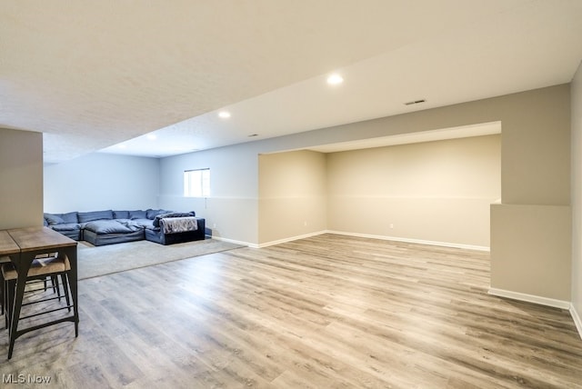 living room with wood-type flooring