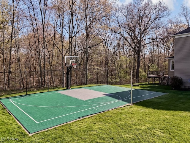 680 Morgan Trl, Aurora, OH 44202 - view of basketball court featuring basketball court, a lawn, and stairs