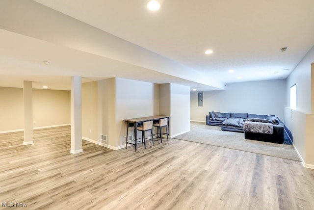 680 Morgan Trl, Aurora, OH 44202 - basement with wood finished floors, baseboards, recessed lighting, and electric panel