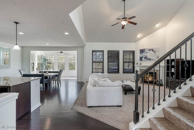 680 Morgan Trl, Aurora, OH 44202 - living room with ceiling fan, stairway, dark wood finished floors, recessed lighting, and baseboards