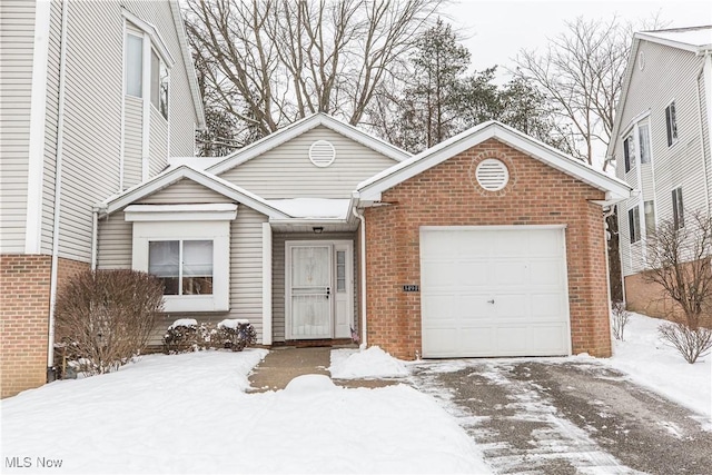 view of front of property featuring a garage