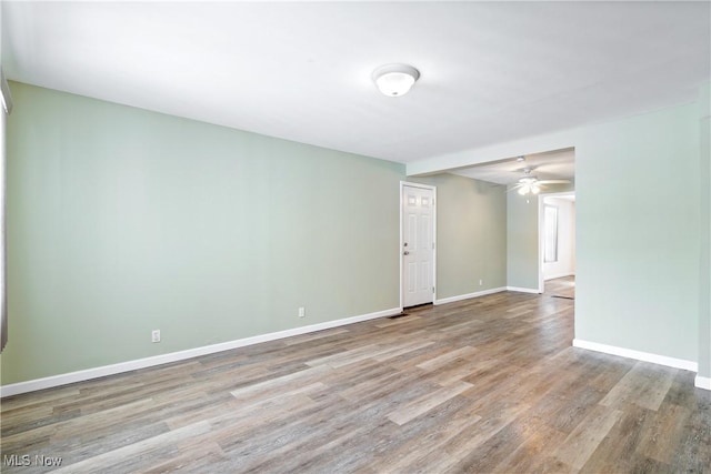 spare room featuring light hardwood / wood-style floors