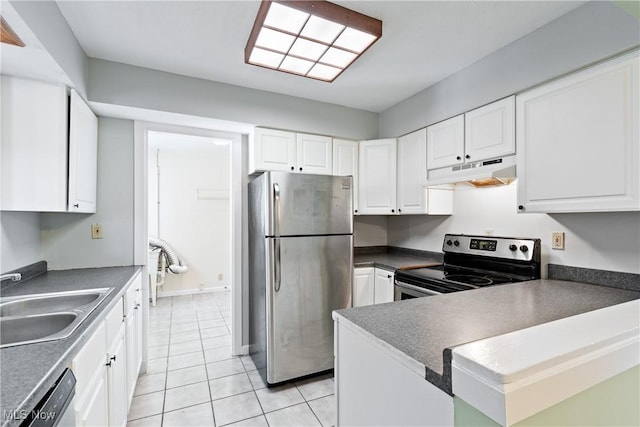 kitchen featuring white cabinets, appliances with stainless steel finishes, light tile patterned floors, and sink