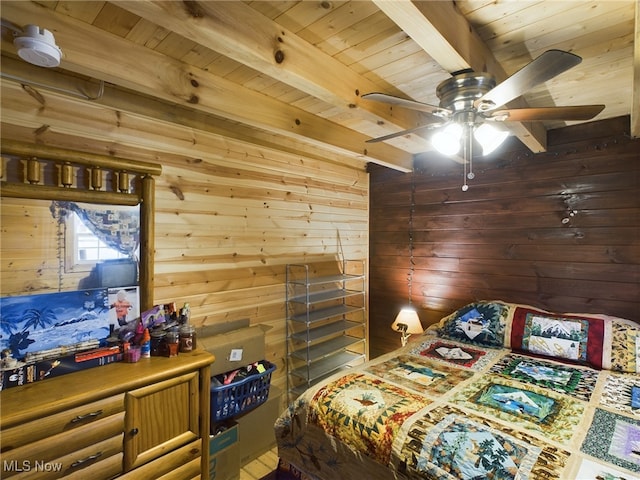 bedroom with beamed ceiling, ceiling fan, wooden ceiling, and wooden walls