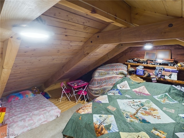 carpeted bedroom with lofted ceiling with beams and wooden ceiling