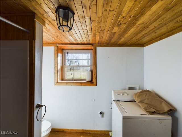 washroom featuring wood ceiling and washer / clothes dryer