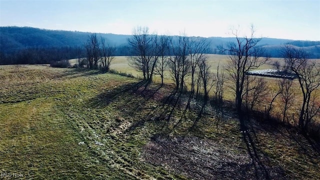 exterior space with a rural view