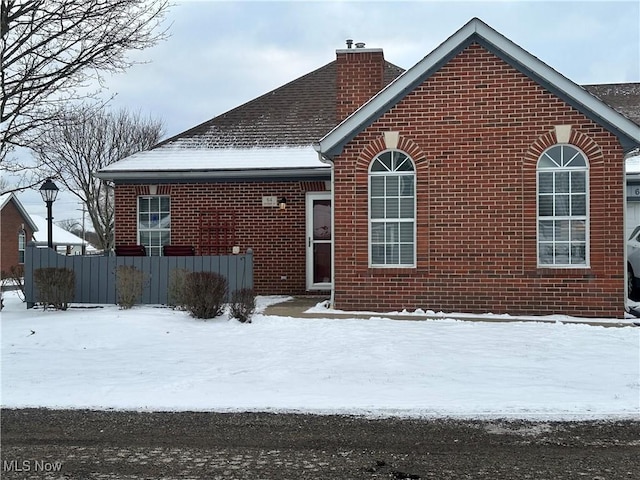 view of snow covered property