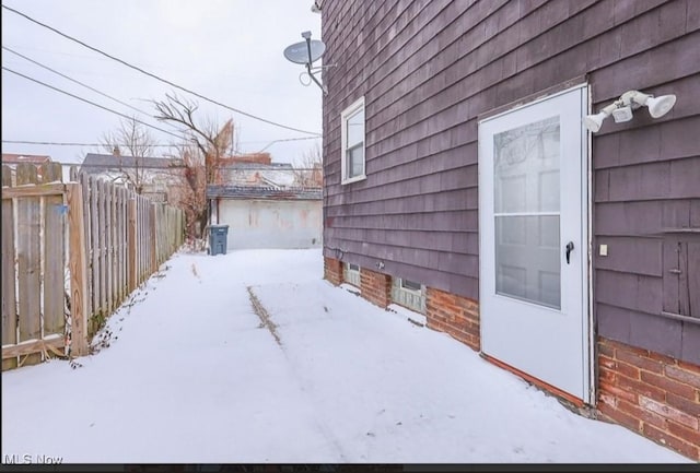 view of yard covered in snow