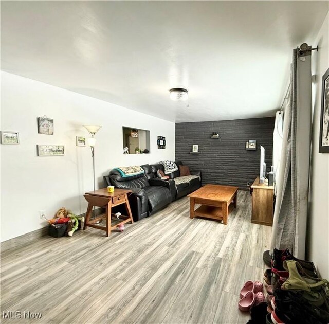 living room with light hardwood / wood-style floors