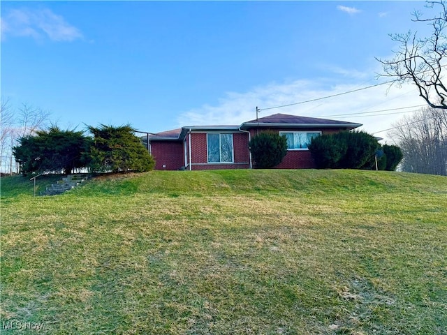 exterior space with a front yard