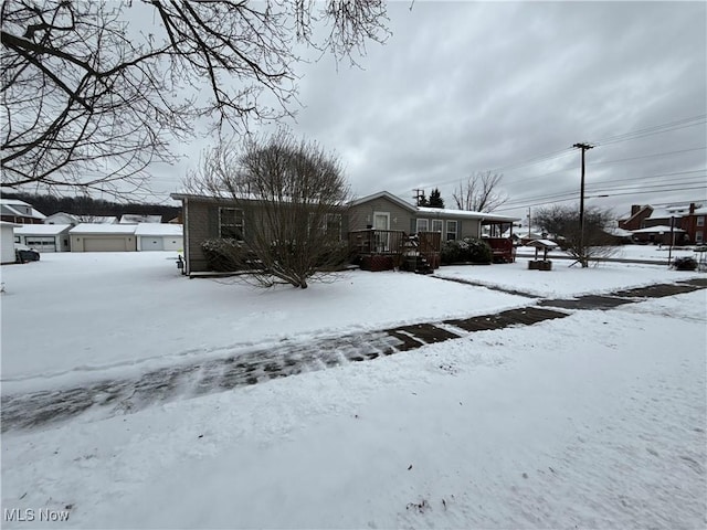 view of front of house with a deck