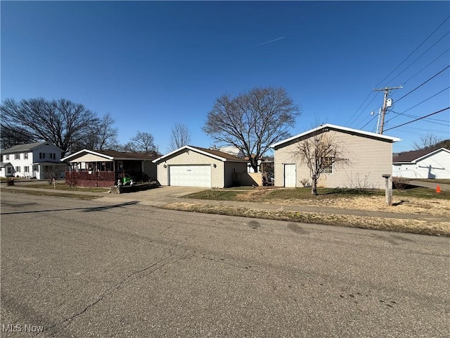 view of front of home with concrete driveway