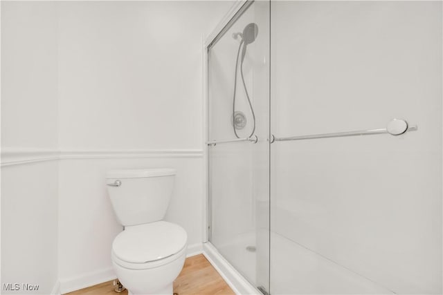 6301 Fiesta Ct, Lorain, OH 44053 - full bath featuring wood finished floors and an enclosed shower