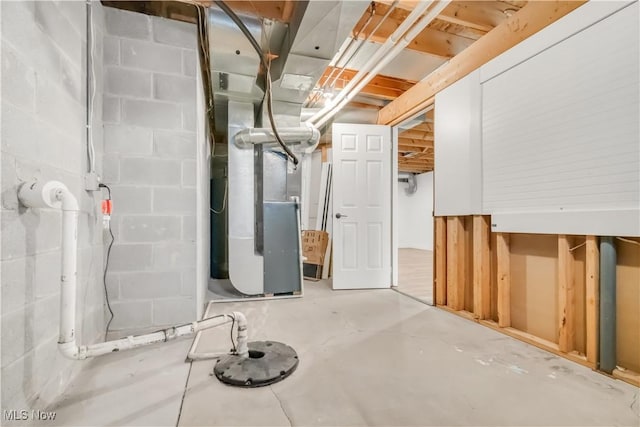 6301 Fiesta Ct, Lorain, OH 44053 - unfinished basement with concrete block wall and heating unit