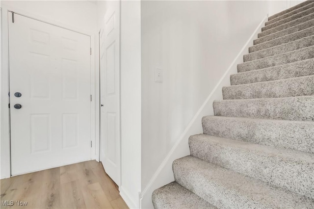 6301 Fiesta Ct, Lorain, OH 44053 - staircase with wood finished floors
