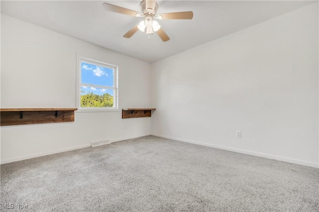 6301 Fiesta Ct, Lorain, OH 44053 - carpeted spare room with baseboards and a ceiling fan