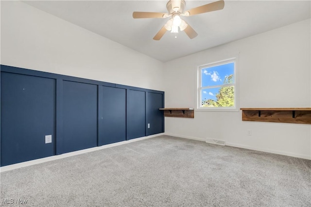 6301 Fiesta Ct, Lorain, OH 44053 - spare room with carpet floors and a ceiling fan