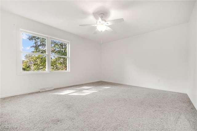 6301 Fiesta Ct, Lorain, OH 44053 - unfurnished room with carpet and ceiling fan