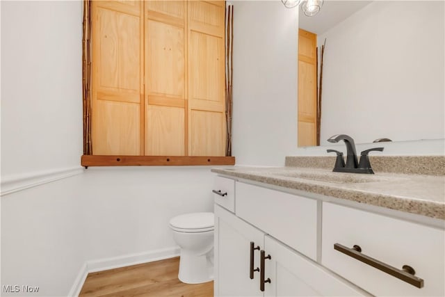 6301 Fiesta Ct, Lorain, OH 44053 - bathroom with vanity and wood finished floors