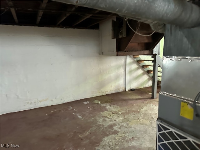 basement featuring heating unit