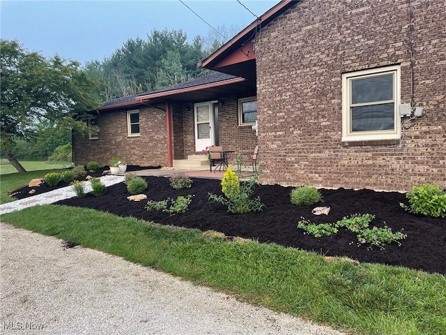 view of property exterior featuring a patio