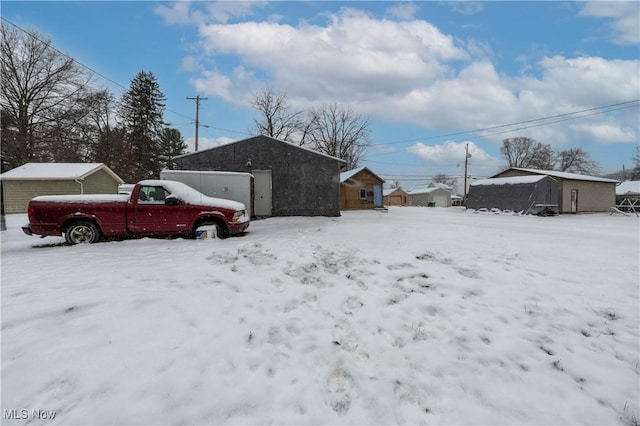 view of yard covered in snow