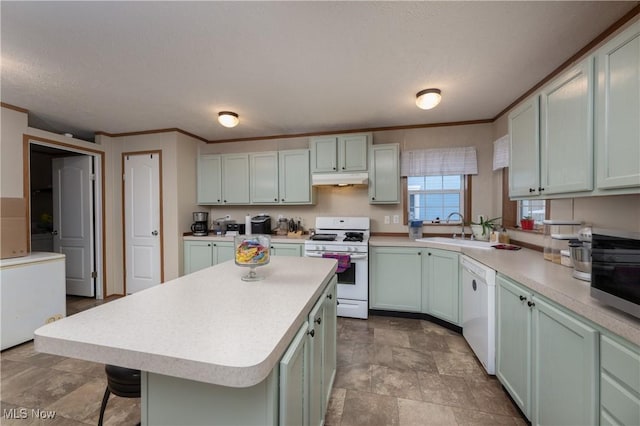 kitchen featuring sink, crown molding, a center island, a textured ceiling, and white appliances