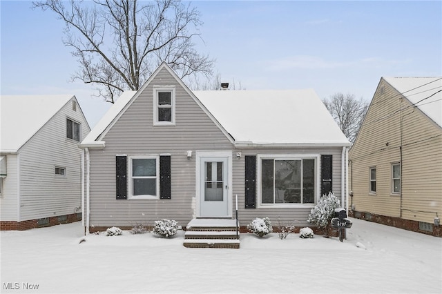 view of new england style home