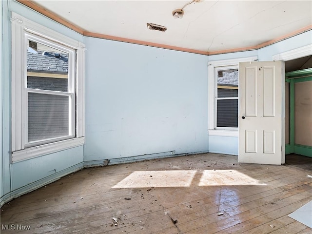 6114 W Clinton Ave, Cleveland, OH 44102 - unfurnished room featuring hardwood / wood-style flooring