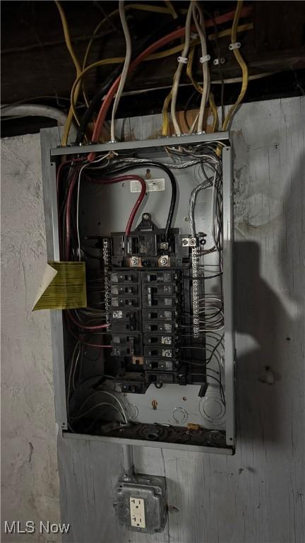 utility room featuring electric panel