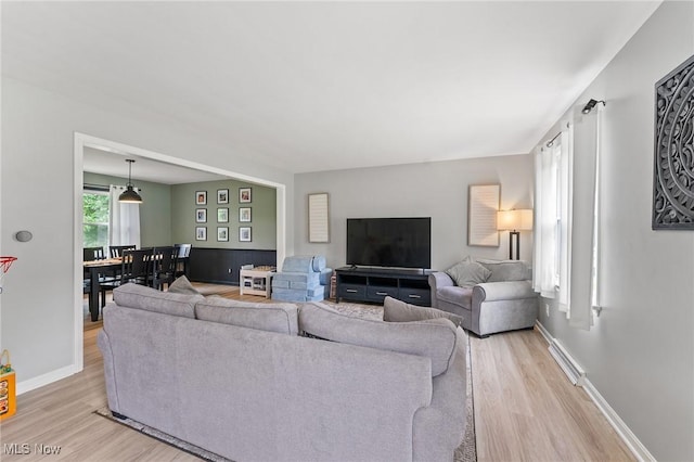 living room featuring light wood-type flooring