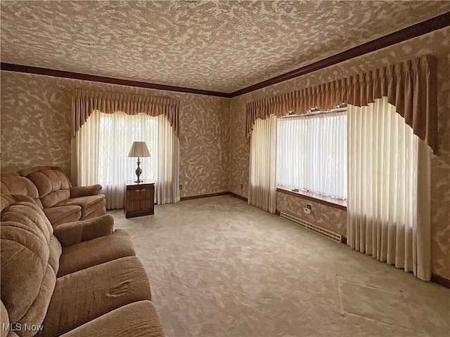 living room with carpet, a healthy amount of sunlight, and crown molding