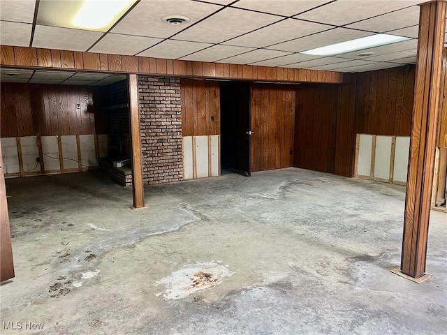 basement with wood walls