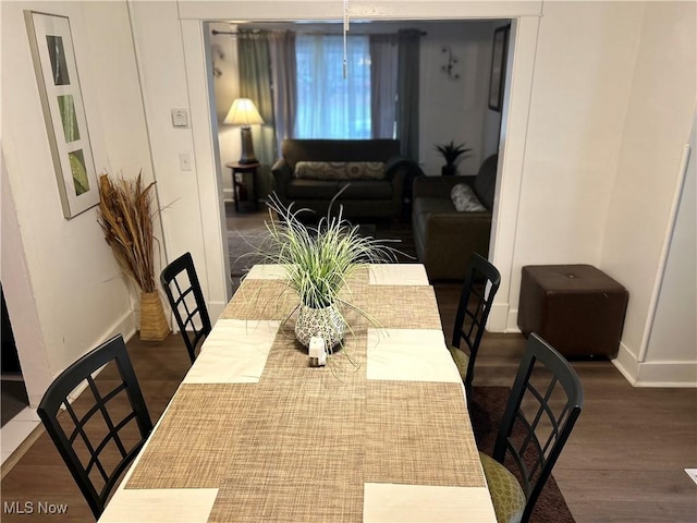 dining room featuring dark hardwood / wood-style floors